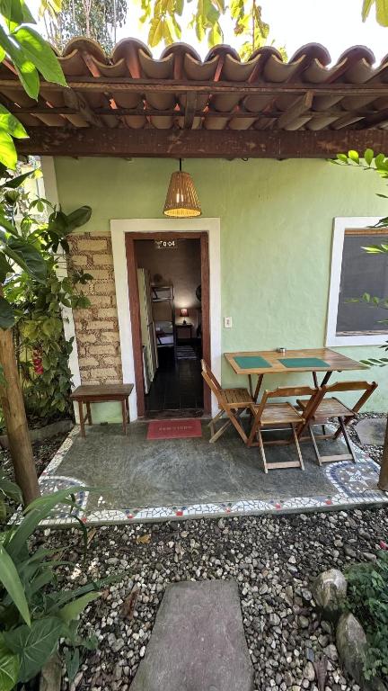 Patio nebo venkovní prostory v ubytování Pousada e Hostel Pé no Mato