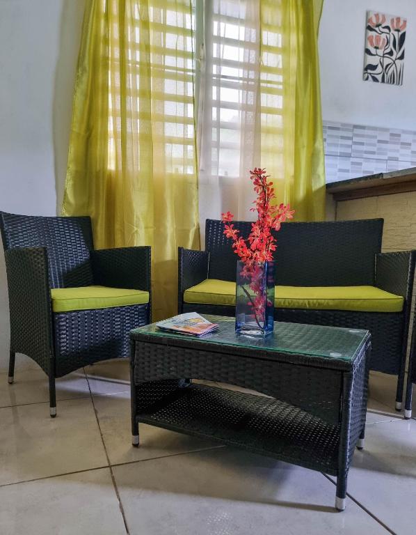 Posezení v ubytování Cattleya Flor Hotel