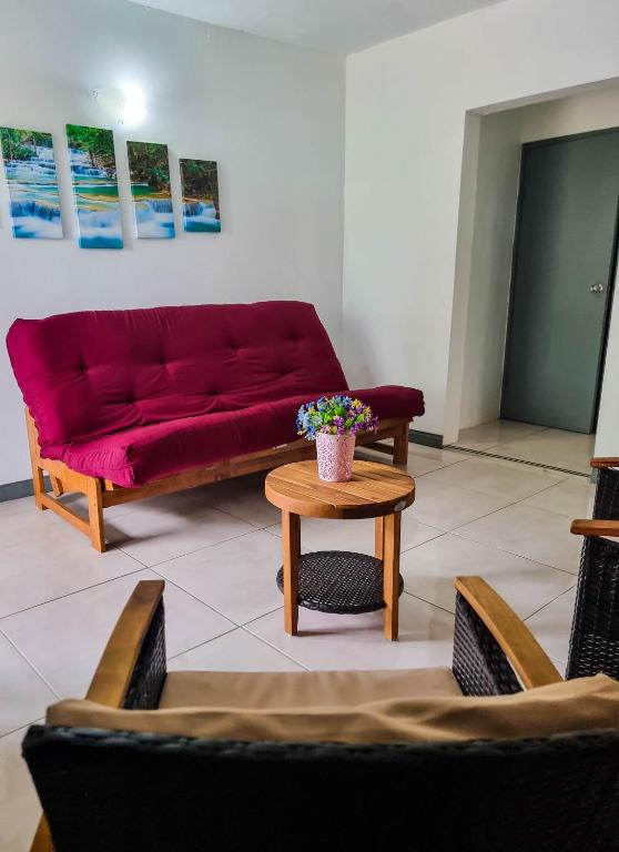 Posezení v ubytování Cattleya Flor Hotel