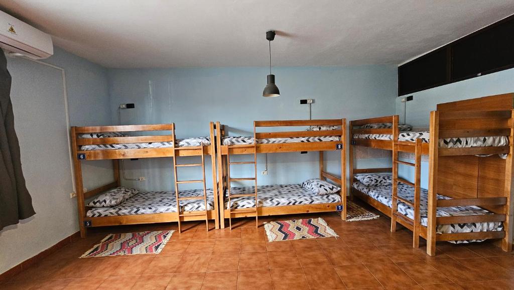 Postel nebo postele na pokoji v ubytování Traveler Hostel