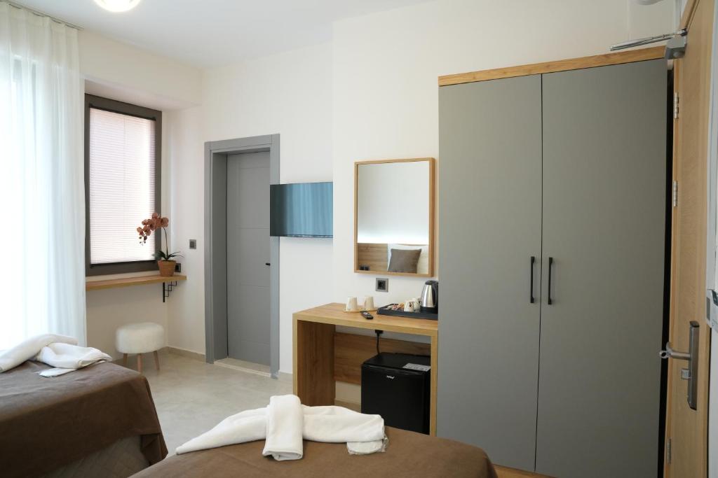 Postel nebo postele na pokoji v ubytování Naturalis Pamukkale Otel