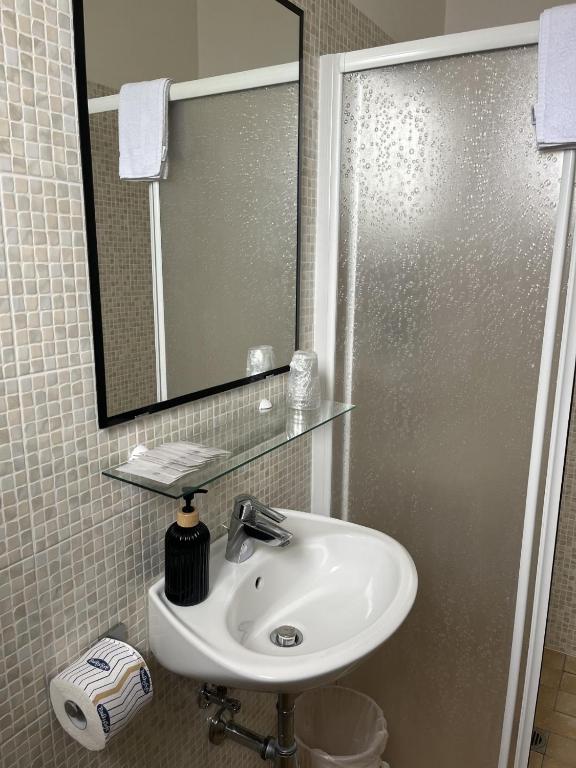 Koupelna v ubytování Hotel Roma