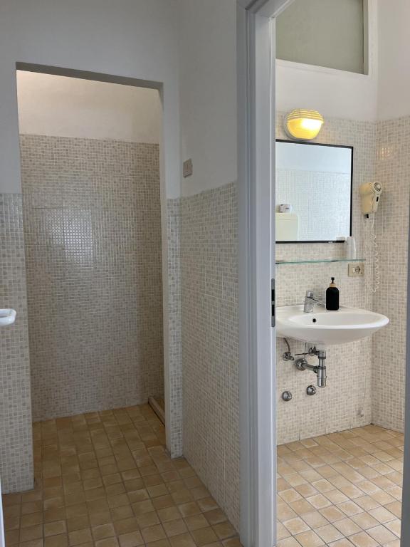 Koupelna v ubytování Hotel Roma