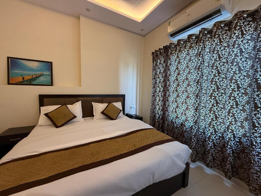 Postel nebo postele na pokoji v ubytování Hotel Pear