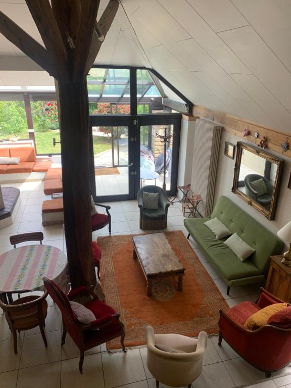 Posezení v ubytování La Victoire de Noyers