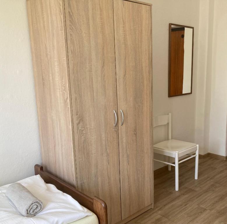 Postel nebo postele na pokoji v ubytování Penzion Cholín