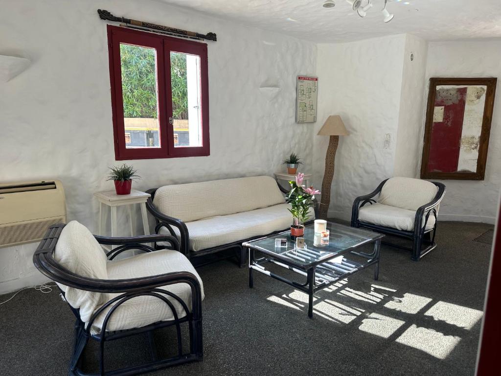 Posezení v ubytování Hôtel Maya