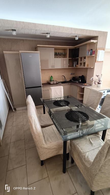 A kitchen or kitchenette at Fáraó vendégház