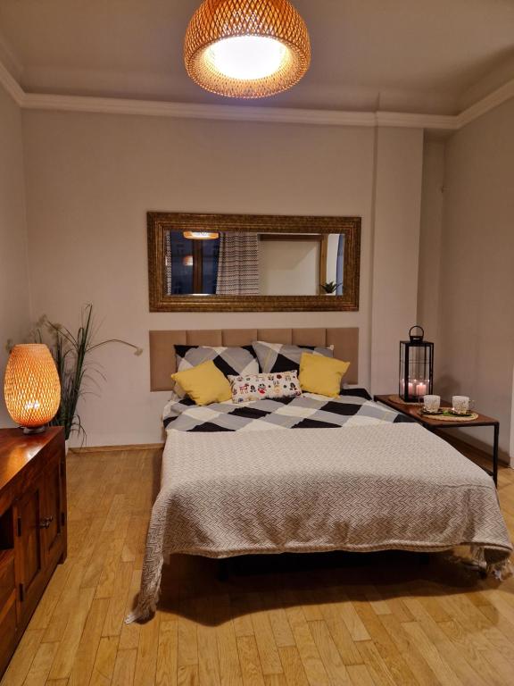 Posteľ alebo postele v izbe v ubytovaní City Center Studio Apartments