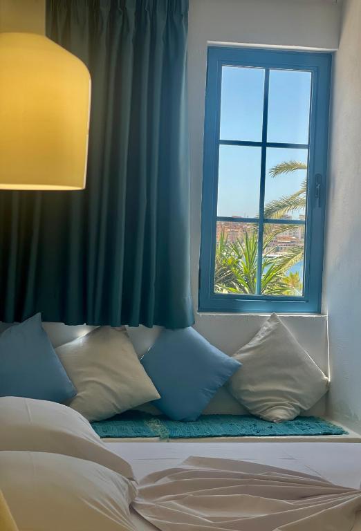 Postel nebo postele na pokoji v ubytování Cava Boutique Hotel