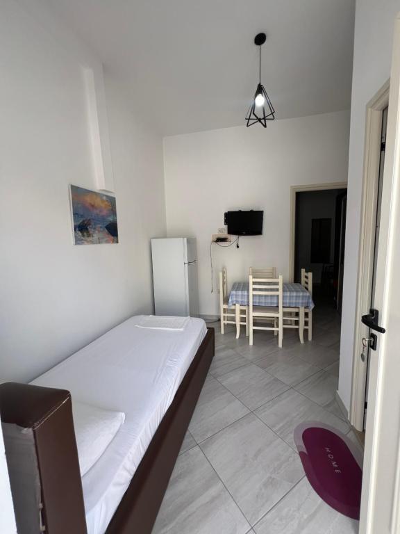 Postel nebo postele na pokoji v ubytování Guest House Vlore
