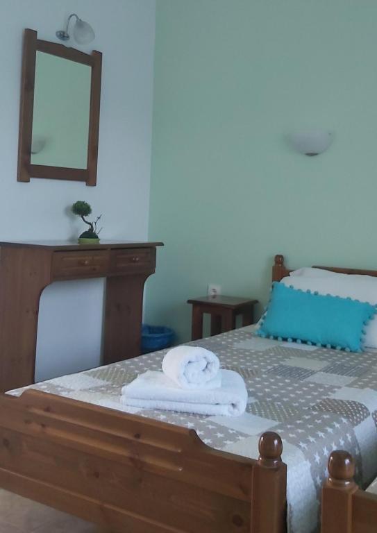 Postel nebo postele na pokoji v ubytování Lemi Apartments