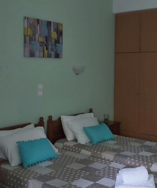 Postel nebo postele na pokoji v ubytování Lemi Apartments