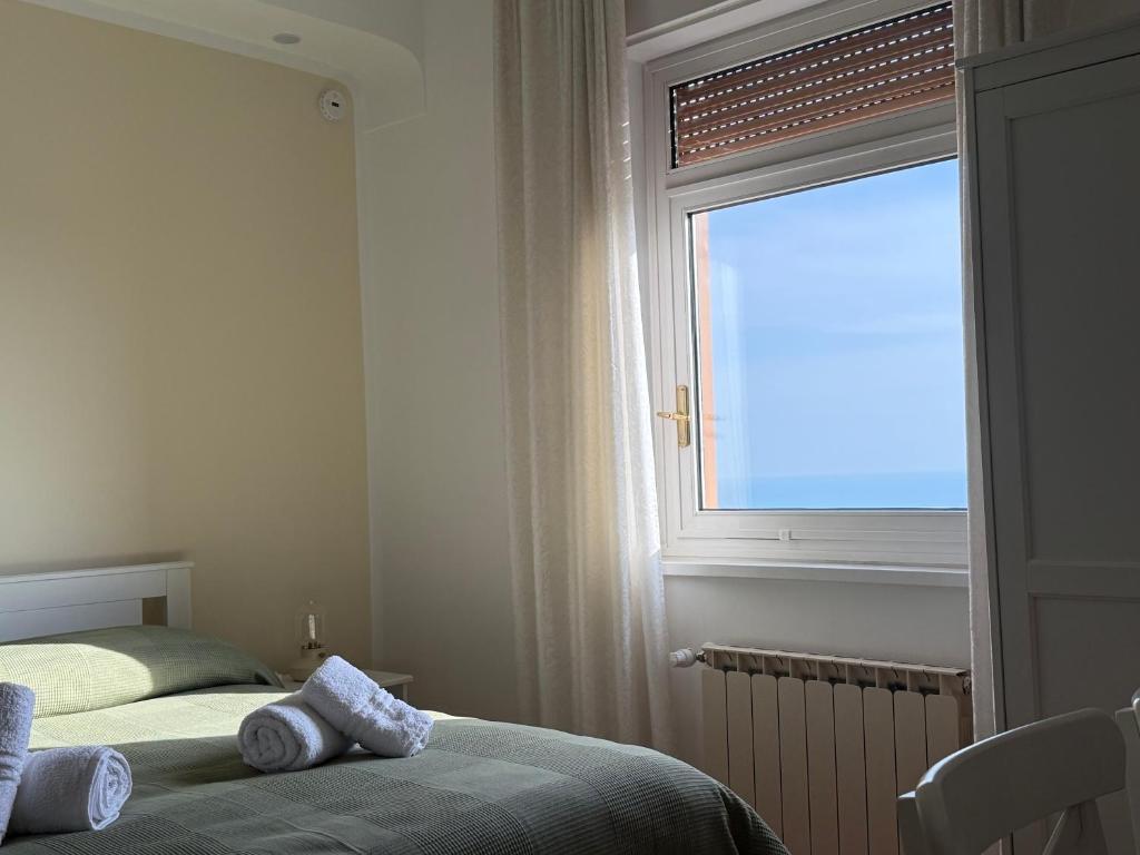 Postel nebo postele na pokoji v ubytování MiraValle Agrigento 2