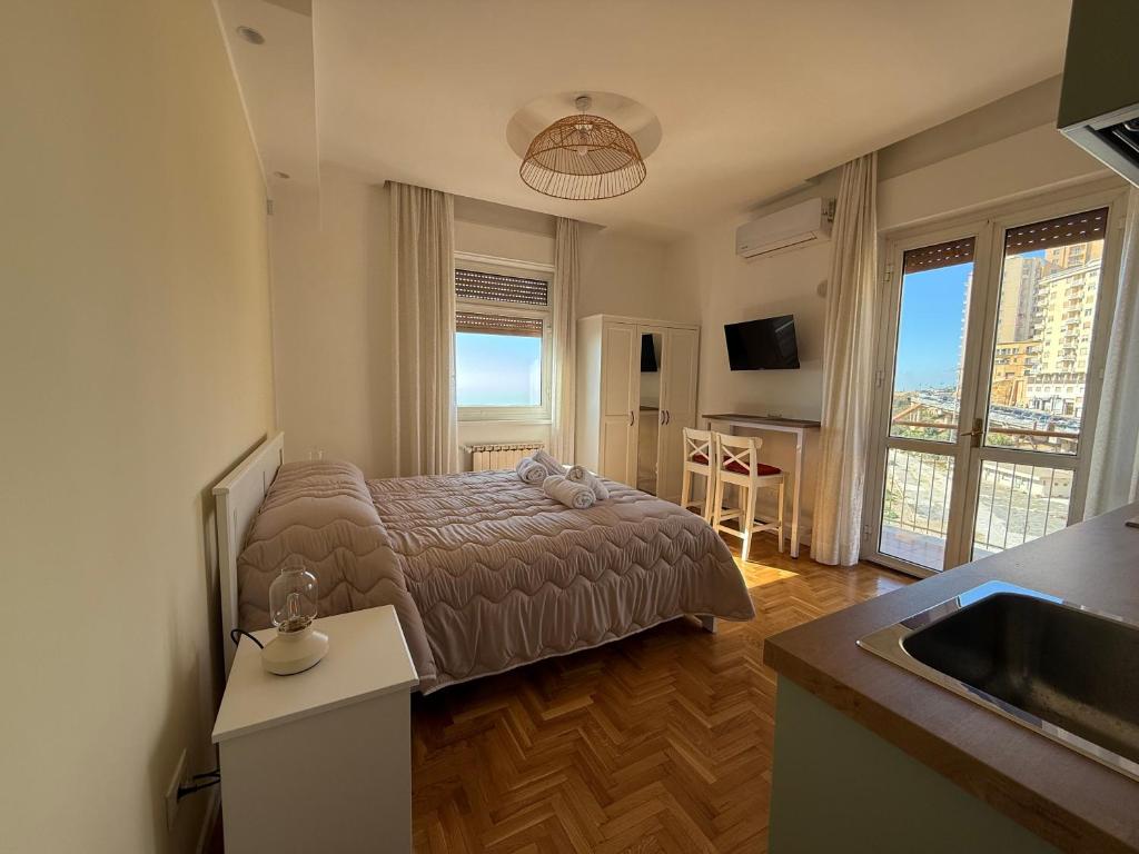 Postel nebo postele na pokoji v ubytování MiraValle Agrigento 2