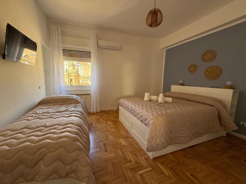 Postel nebo postele na pokoji v ubytování MiraValle Agrigento 2