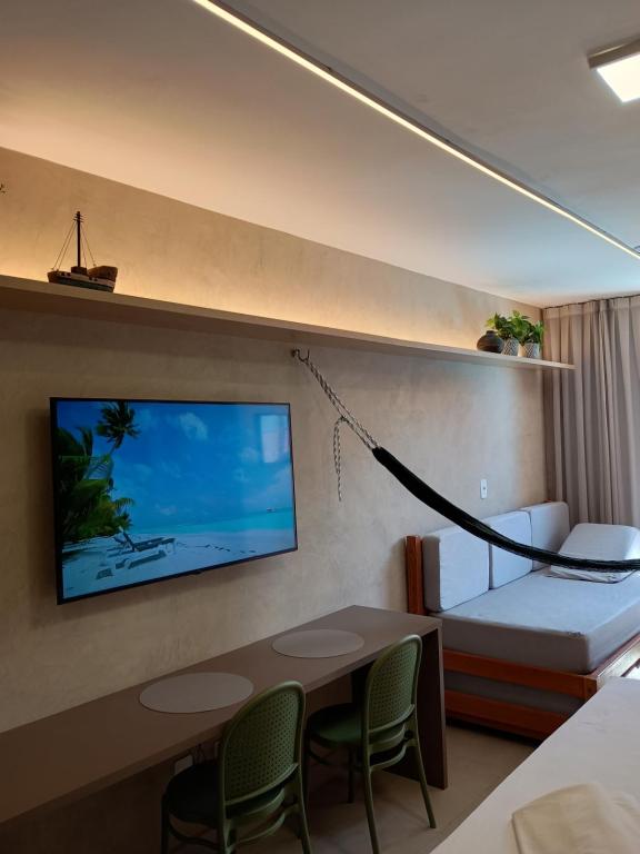 Postel nebo postele na pokoji v ubytování VILA ATLÂNTIDA 211A