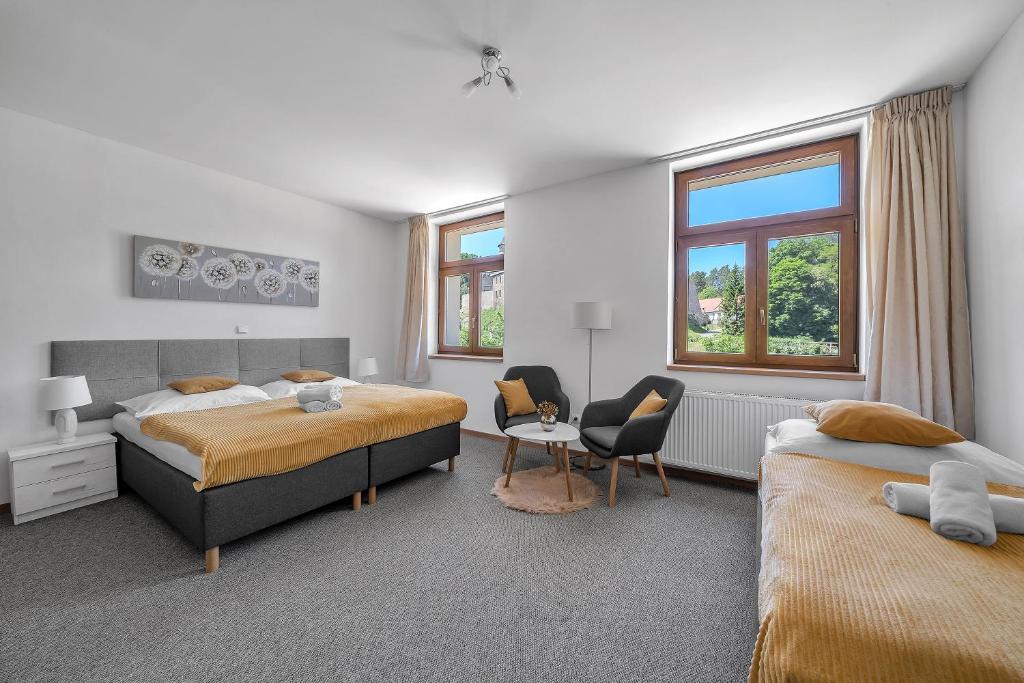 Postel nebo postele na pokoji v ubytování Hotel PODKOST
