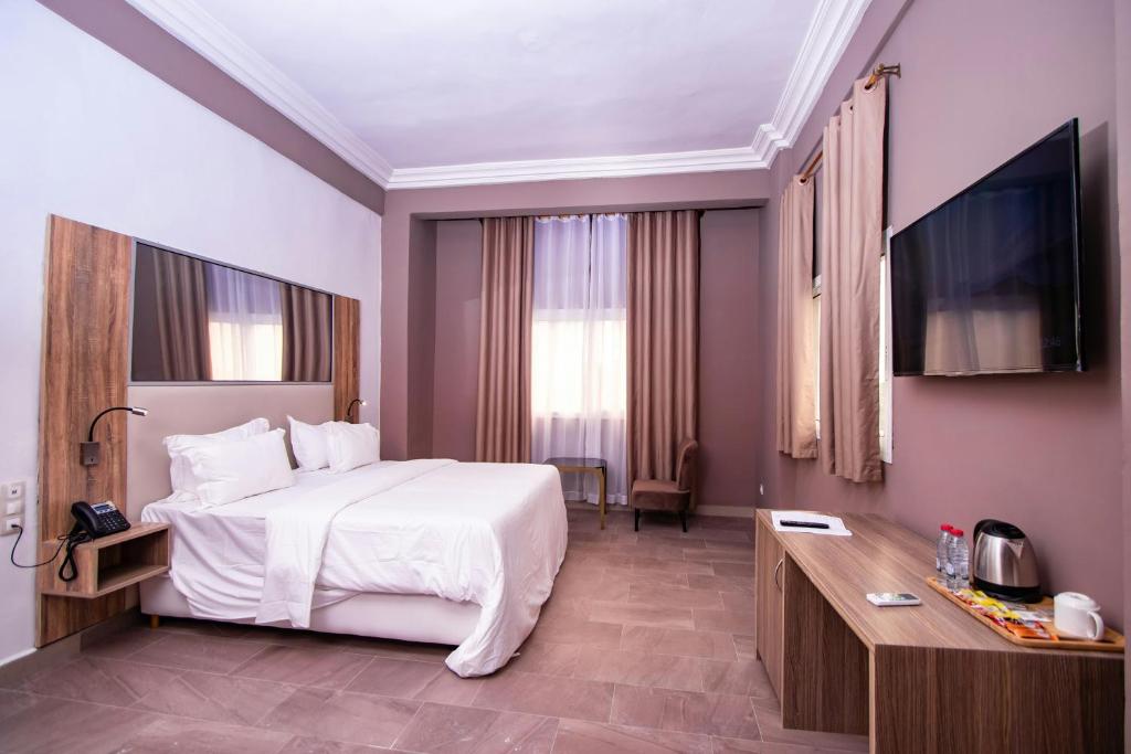 Postel nebo postele na pokoji v ubytování Hotel Park View A Family Hotel Near IGI Airport