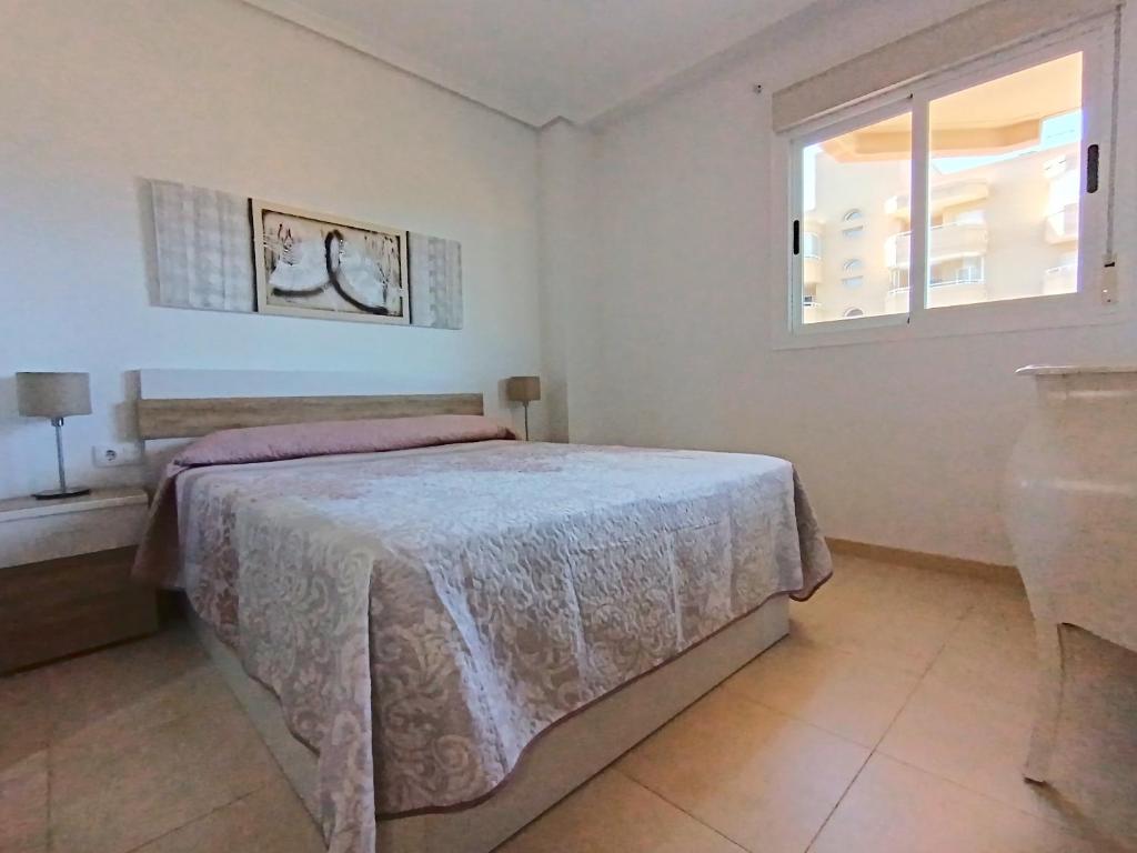 Posteľ alebo postele v izbe v ubytovaní Ayf 3 habitaciones en 1ª linea de playa