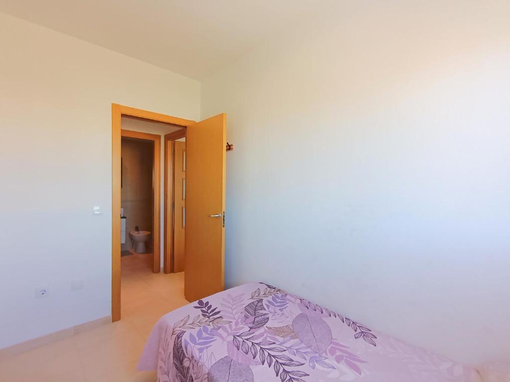 Posteľ alebo postele v izbe v ubytovaní Ayf 3 habitaciones en 1ª linea de playa