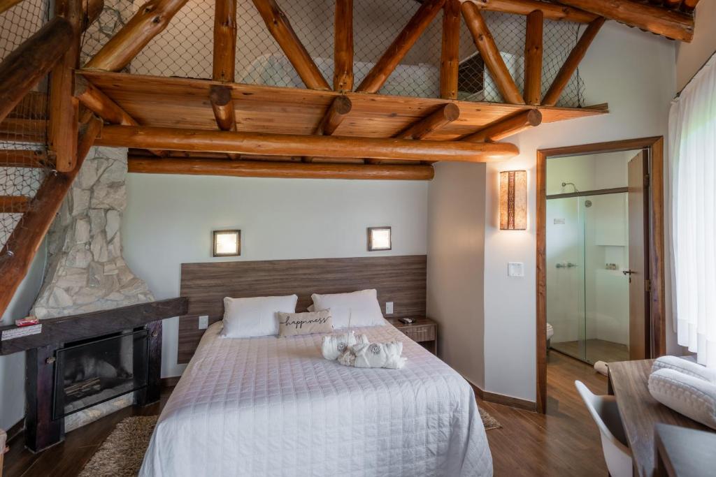 Postel nebo postele na pokoji v ubytování Virá Charme Resort