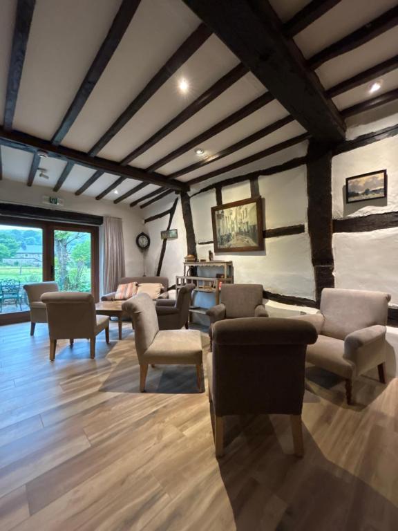 Posezení v ubytování Auberge du Val d'Aisne