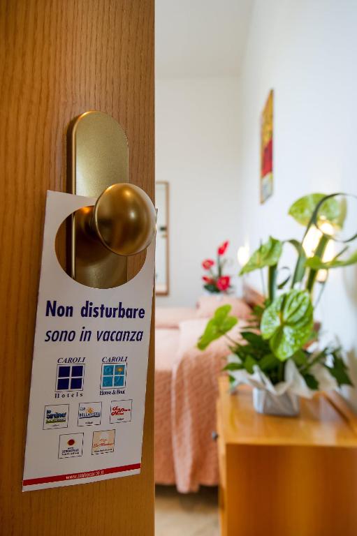 Postel nebo postele na pokoji v ubytování Joli Park Hotel - Caroli Hotels