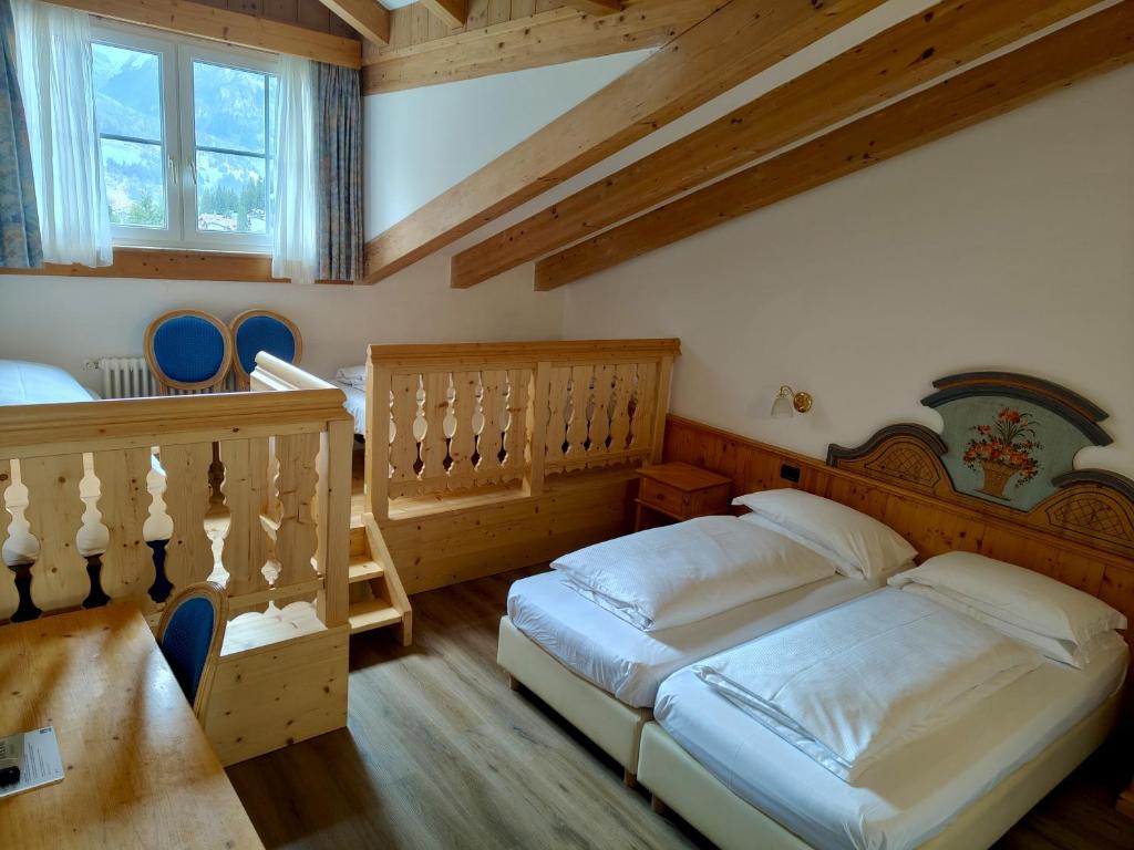 Postel nebo postele na pokoji v ubytování Hotel Valacia