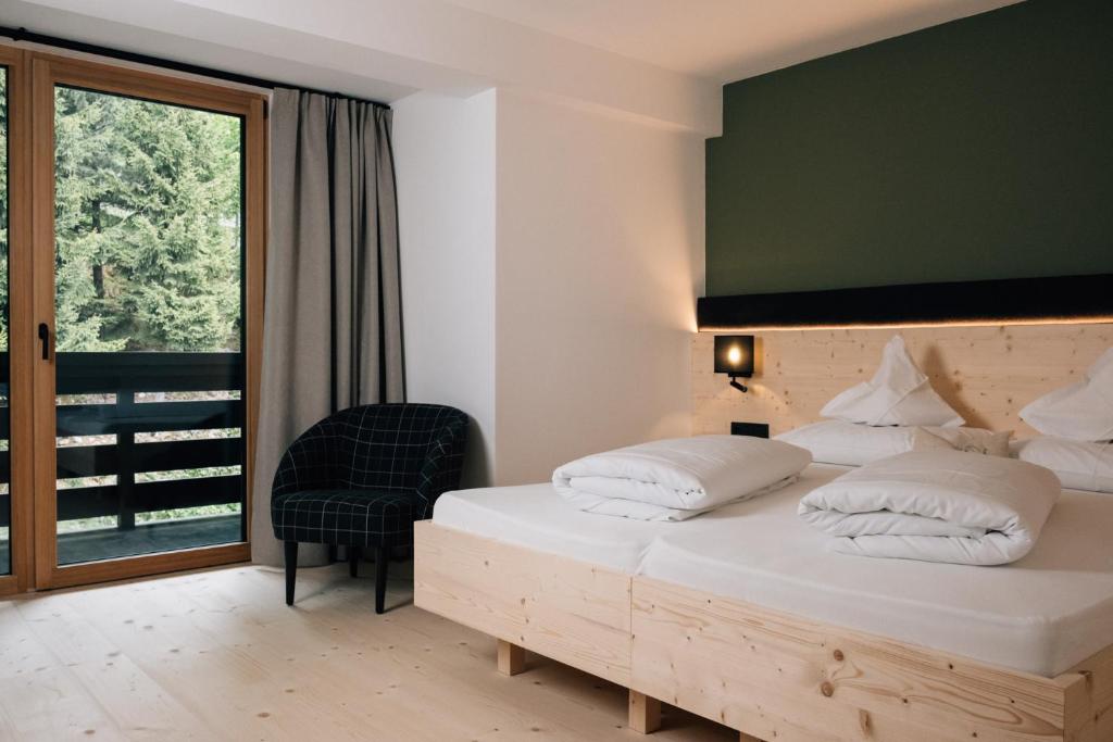 Postel nebo postele na pokoji v ubytování Hotel Jägerhof