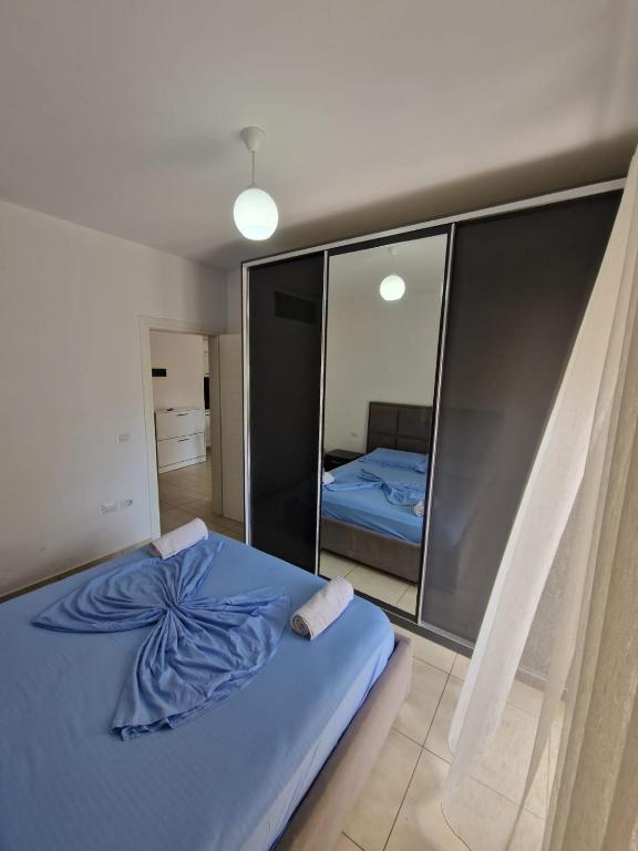 Postel nebo postele na pokoji v ubytování Summer Apartments in Shengjin