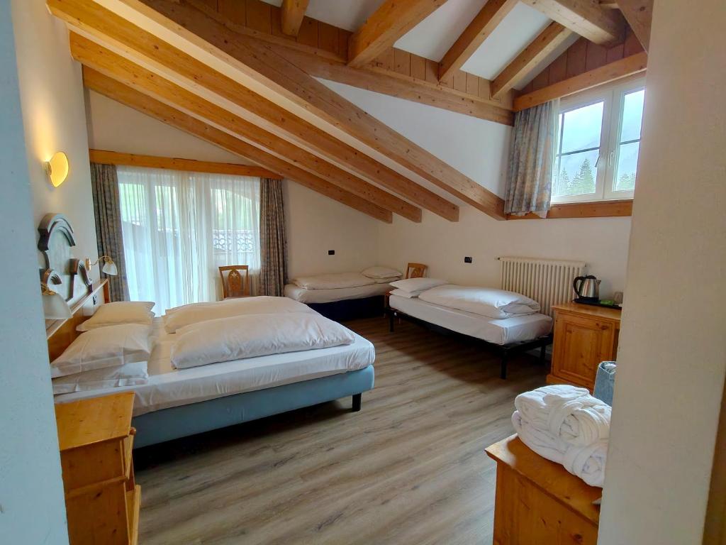 Postel nebo postele na pokoji v ubytování Hotel Valacia