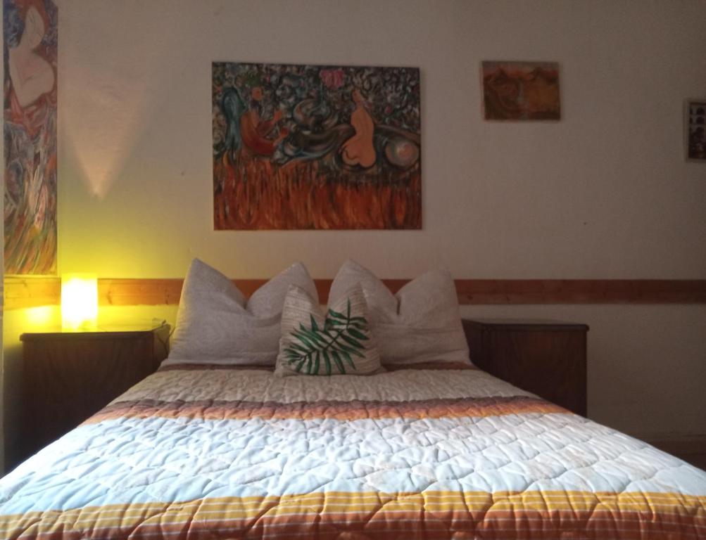 a bedroom with a bed with at Ca' del Portico in Valsolda
