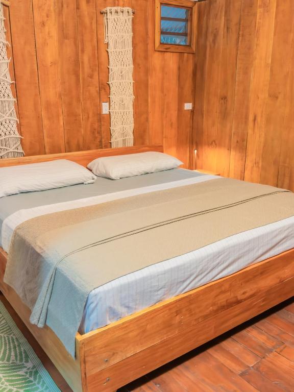 Postel nebo postele na pokoji v ubytování Tangoré