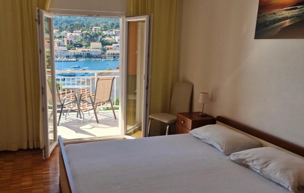 Postel nebo postele na pokoji v ubytování Bleus Apartments