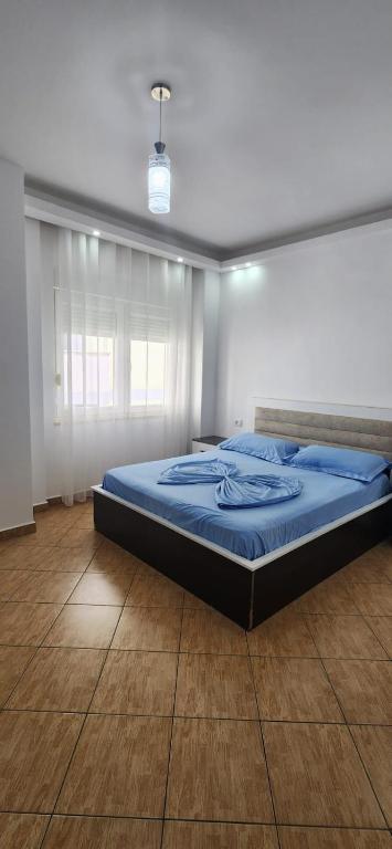 Postel nebo postele na pokoji v ubytování Summer Apartments in Shengjin