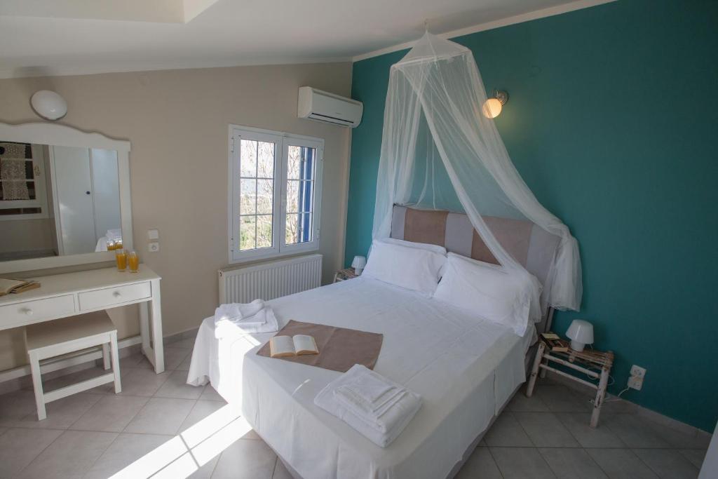 Postel nebo postele na pokoji v ubytování Villa Theodora