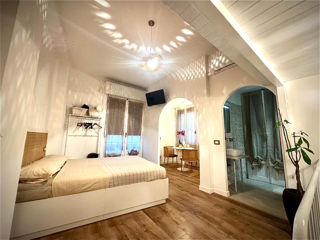 Postel nebo postele na pokoji v ubytování Il Vicolo B&B GIUBILEO