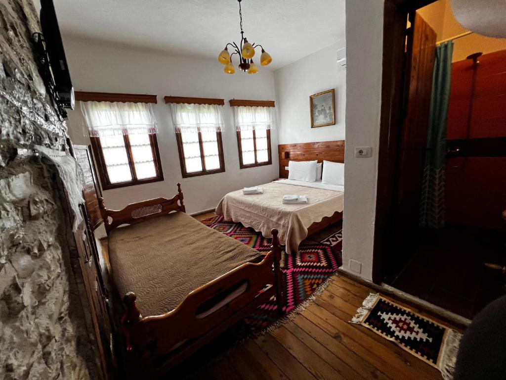 Postel nebo postele na pokoji v ubytování Guest House Salaria