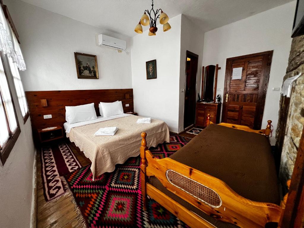 Postel nebo postele na pokoji v ubytování Guest House Salaria