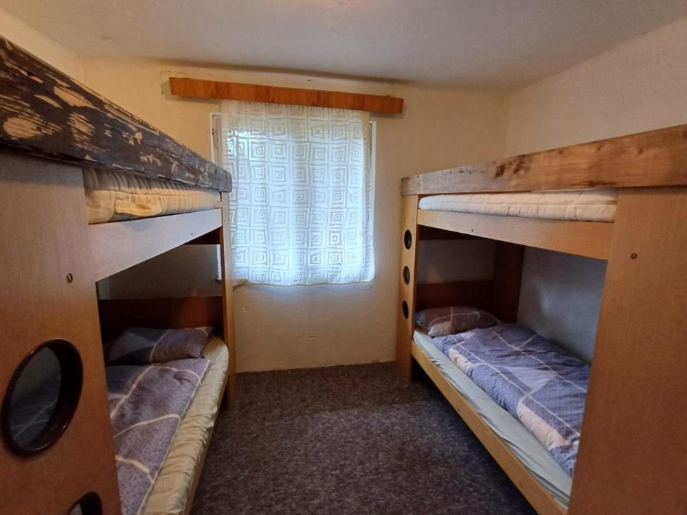 Postel nebo postele na pokoji v ubytování Kolečko