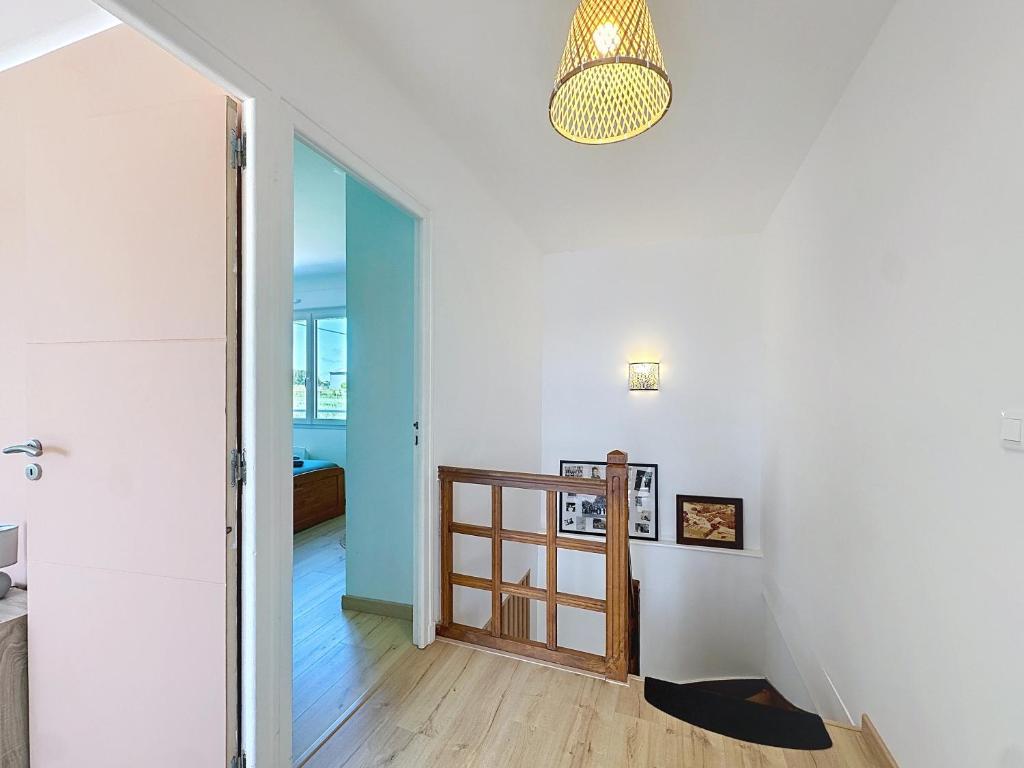 Postel nebo postele na pokoji v ubytování Gîtes Ti Tud-Kozh Le Guébriand et L'Arguenon