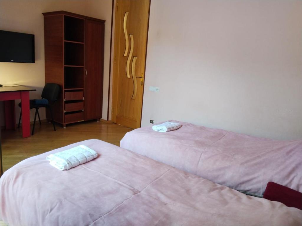 Postel nebo postele na pokoji v ubytování Villa Vanila