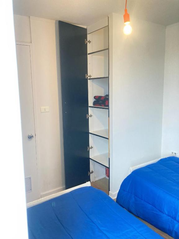 Postel nebo postele na pokoji v ubytování Departamento Amoblado
