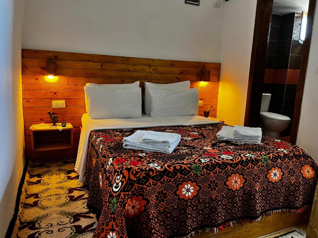 Postel nebo postele na pokoji v ubytování Guest House Salaria