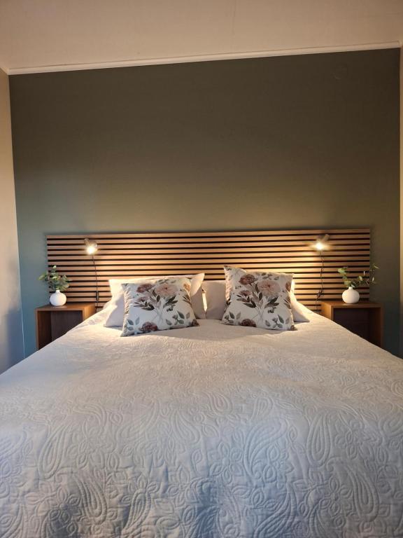Postel nebo postele na pokoji v ubytování Kattugglans Guestroom