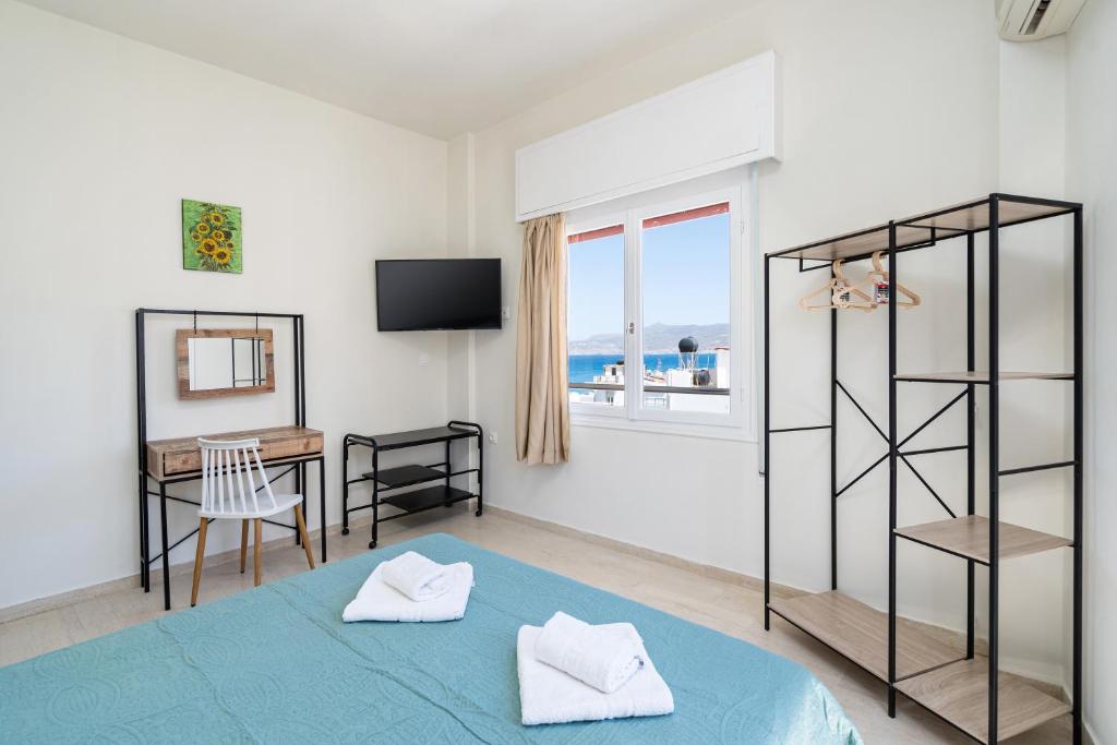 Televisyen dan/atau pusat hiburan di Aloe Apartments Sitia