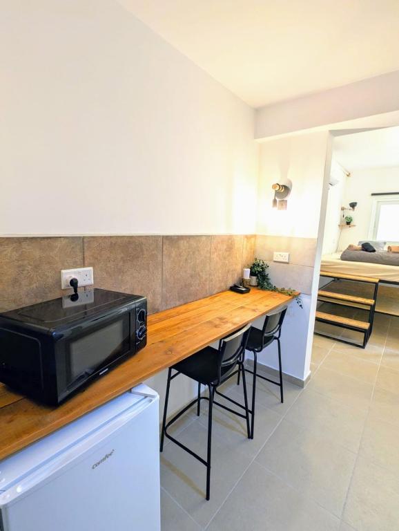 Kuchyň nebo kuchyňský kout v ubytování Gozo Vacation Studios