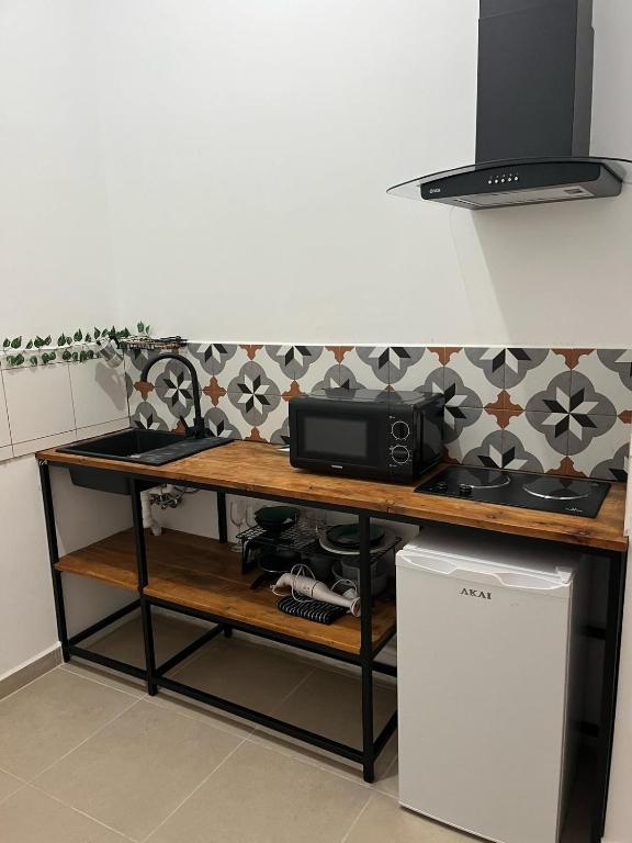 Kuchyň nebo kuchyňský kout v ubytování Gozo Vacation Studios