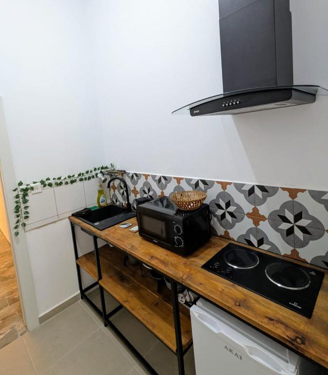 Kuchyň nebo kuchyňský kout v ubytování Gozo Vacation Studios